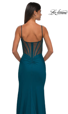 A woman is seen from behind in the La Femme 32763 Plunging V-Neck Long Prom Dress, featuring a teal color, sleeveless style, sheer mesh back, and zipper closure. The La Femme logo is visible in the top right corner.
