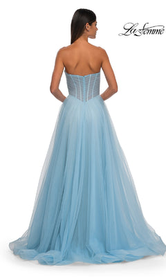 Woman wearing the La Femme 32789 Strapless Long Prom Ball Gown, featuring a fitted sweetheart bodice with visible boning and a floor-length light blue tulle skirt, photographed from the back.