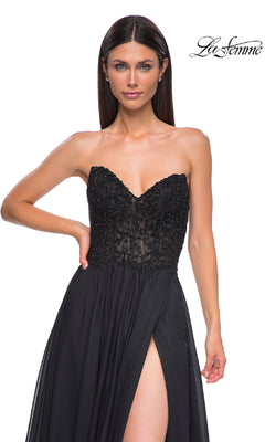 A woman in the La Femme 32804 strapless long A-line prom dress with a beaded bodice and high slit poses against a white background. The La Femme logo is visible in the top right corner.