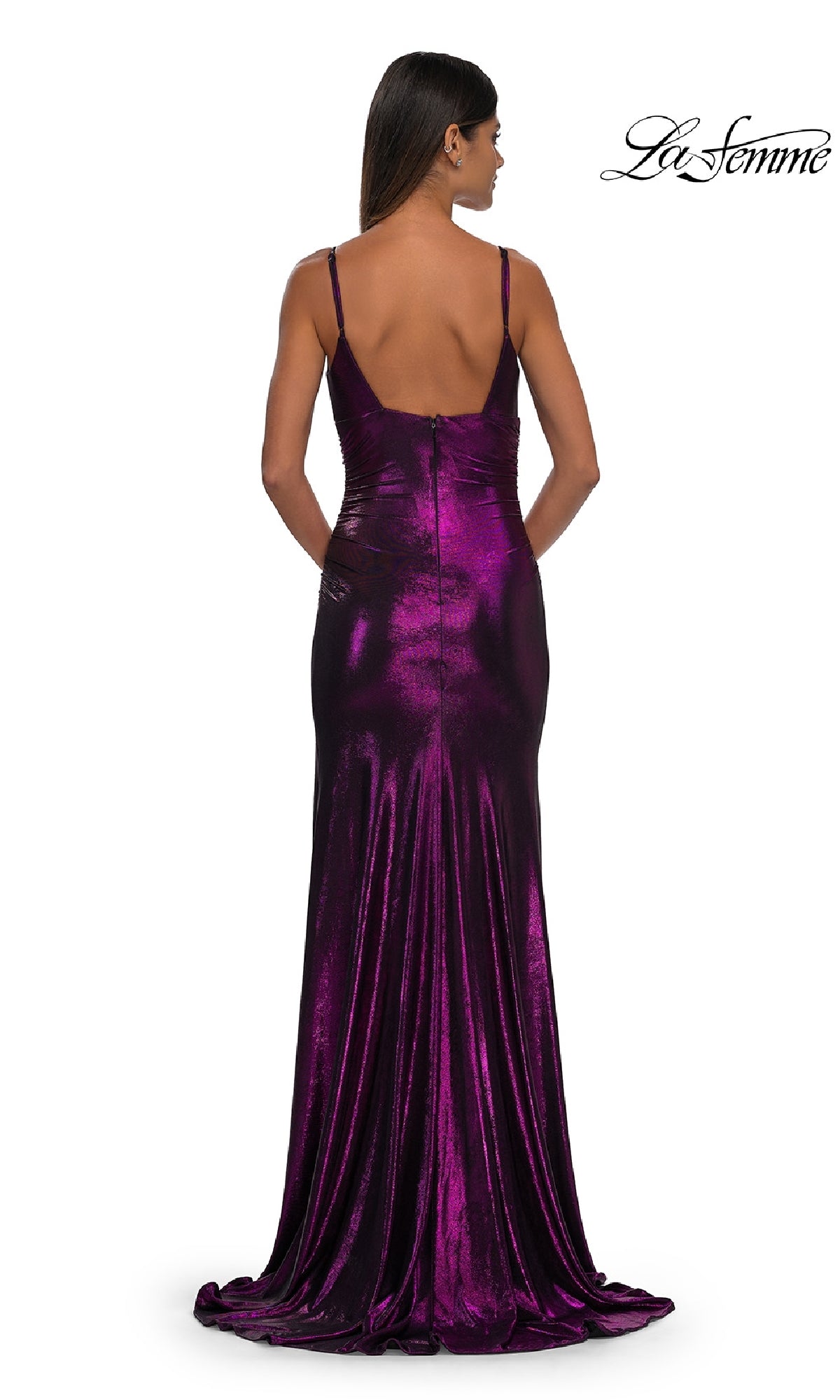 Woman in the V-Neck Long Metallic Prom Dress (La Femme 32812), sleeveless with a low back and floor-length train, stands against a white background. The La Femme logo appears in the top right corner.
