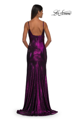 Woman in the V-Neck Long Metallic Prom Dress (La Femme 32812), sleeveless with a low back and floor-length train, stands against a white background. The La Femme logo appears in the top right corner.