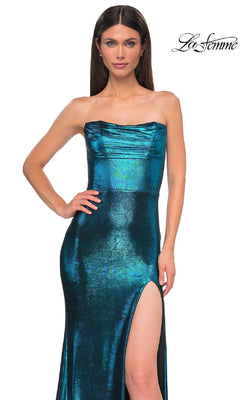 A woman models the Strapless Long Metallic Prom Dress: La Femme 32828 in teal, featuring a fitted silhouette, high slit, and draped neckline. "La Femme" logo appears in the top right corner.