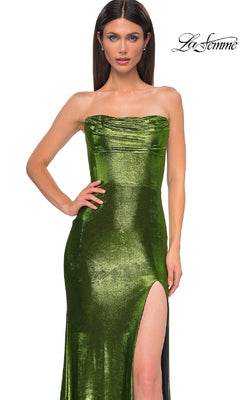 A woman models the Strapless Long Metallic Prom Dress: La Femme 32828 in green, featuring a thigh-high slit, against a white background with the La Femme logo in the top right corner.