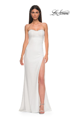 A woman in the Lace-Up Strapless Long Prom Dress: La Femme 32829 with a thigh-high slit and silver heels stands against a white background. The elegant gown has beaded trim, and the "La Femme" logo is in the top right corner.