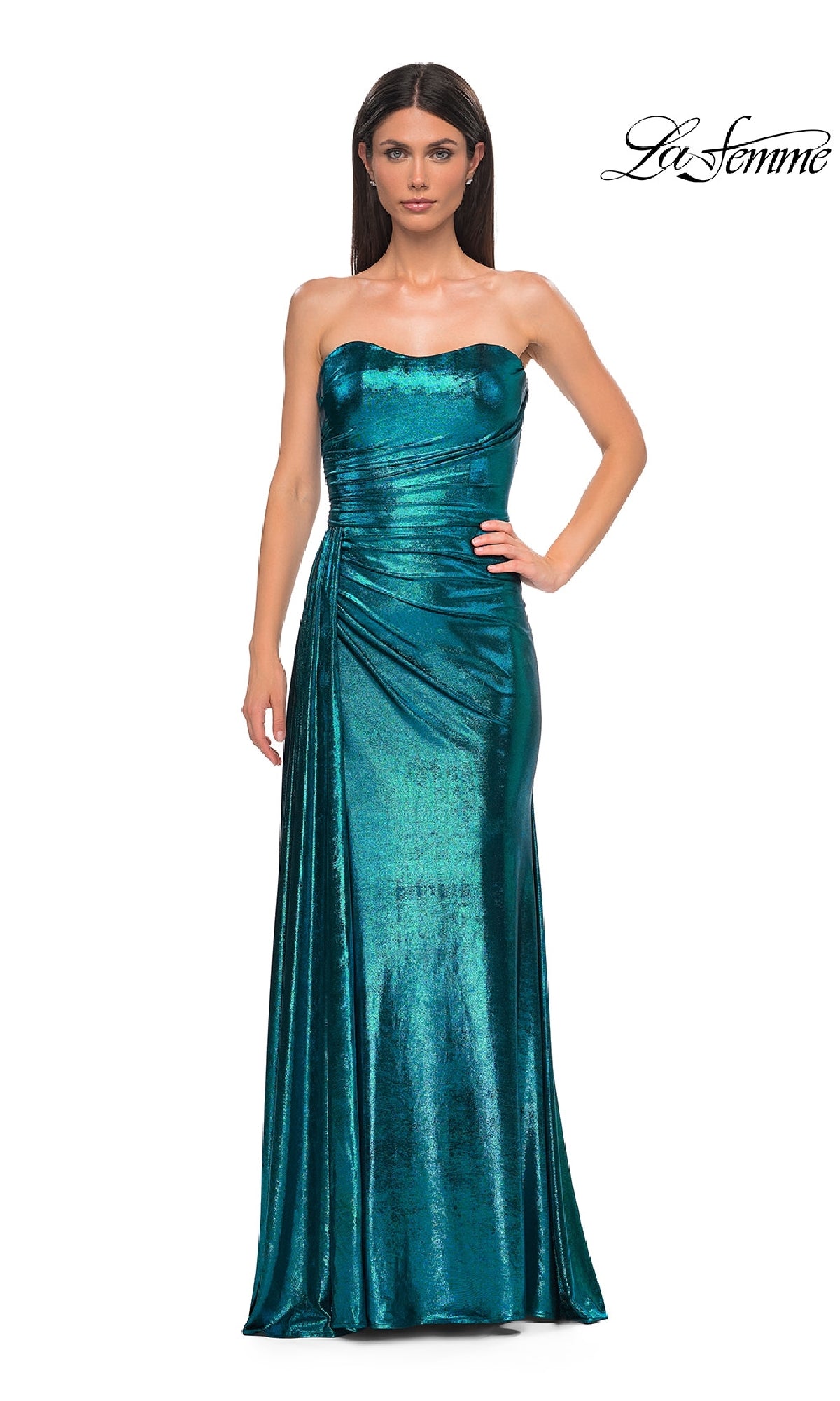 A woman in the Strapless Long Metallic Prom Dress: La Femme 32830 in teal stands facing forward, one hand on her hip, against a plain white background. The 