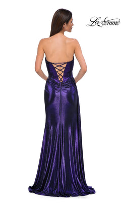 A woman models the Strapless Long Metallic Prom Dress: La Femme 32830, featuring a lace-up back, against a white background. The La Femme logo appears in the top right corner.