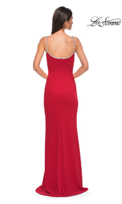 Woman in the Bead-Trimmed Long Prom Dress: La Femme 32844, fitted and floor-length with thin embellished straps, straight neckline, and slight train. La Femme logo appears in the top right corner; model shown from the back.