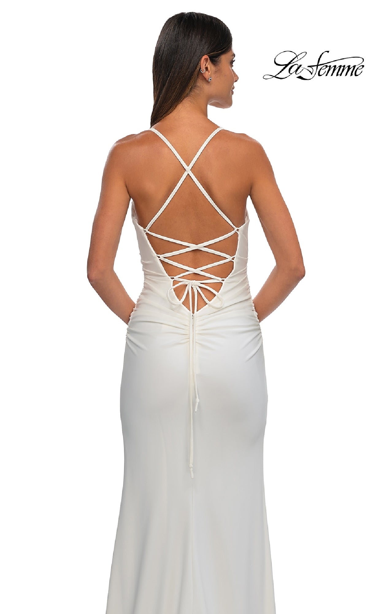 A woman models the Strappy-Back Long Prom Dress: La Femme 32851, featuring a lace-up back, against a plain white background. The 