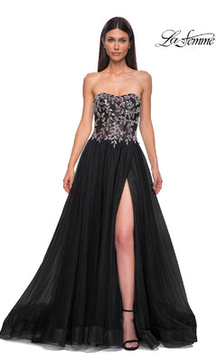 Woman wearing the La Femme 32862 Beaded-Corset Strapless Prom Gown featuring a beaded corset, floral embroidered bodice, sheer skirt, and high slit, posed against a plain white background.