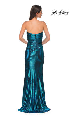 Woman in the Bodycon Long Metallic Prom Dress: La Femme 32876, featuring a strapless, ruched design with a floor-length hem and subtle sweetheart neckline. Seen from the back. La Femme logo appears in the upper right corner.