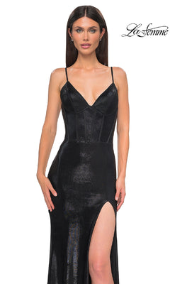A woman wears the sleeveless, fitted La Femme 32877 Lace-Up Long Metallic Prom Dress with a thigh-high slit, standing against a white background. The "La Femme" logo is in the top right corner.