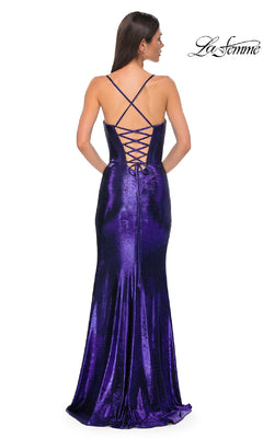 Model wears the La Femme 32877 Lace-Up Long Metallic Prom Dress, featuring a crisscross and lace-up back, with her back to the camera. The La Femme logo is in the top right corner.