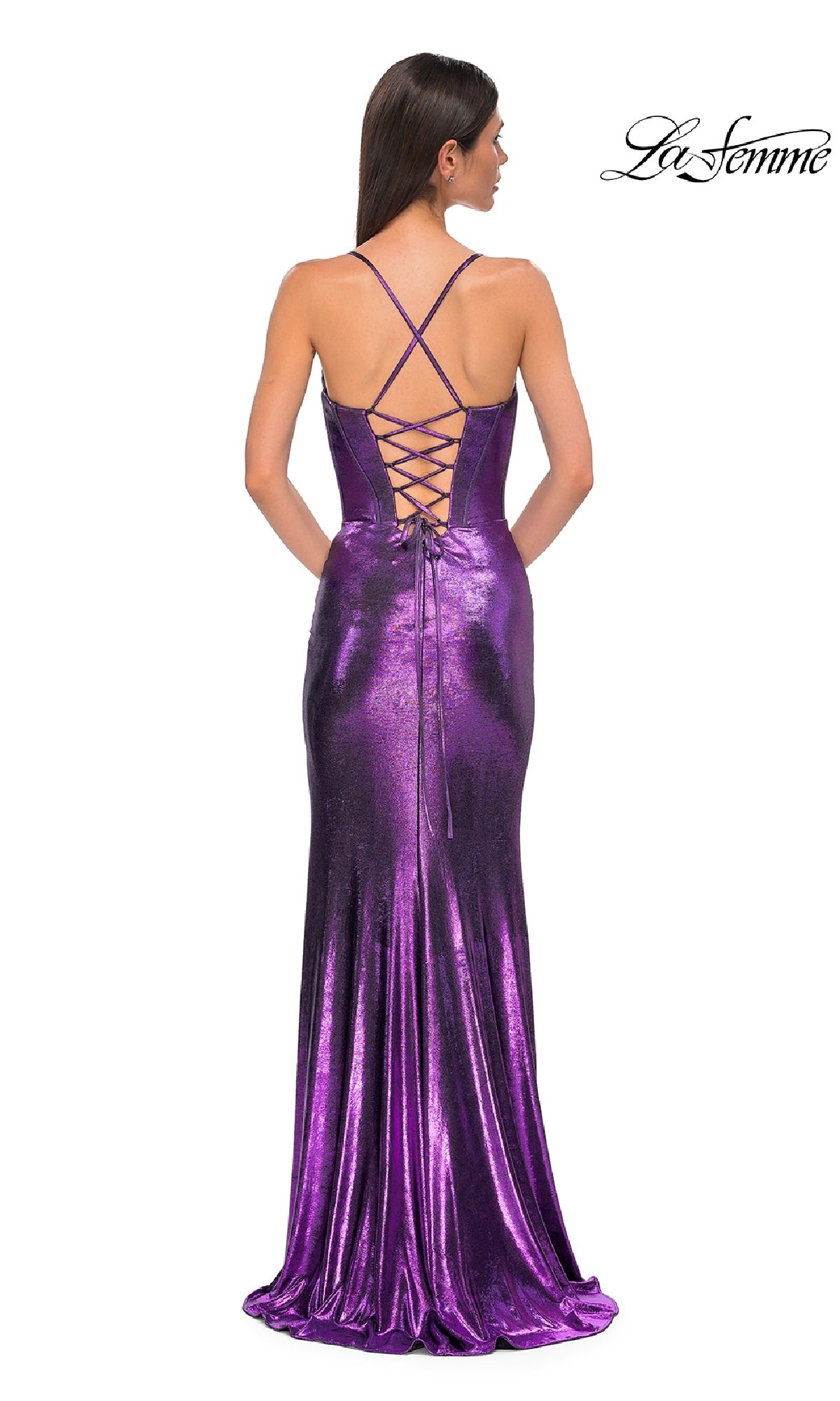 A woman, facing away, wears the Lace-Up Long Metallic Prom Dress: La Femme 32877 in shiny purple with crisscross lace-up back; La Femme logo appears in the top right.