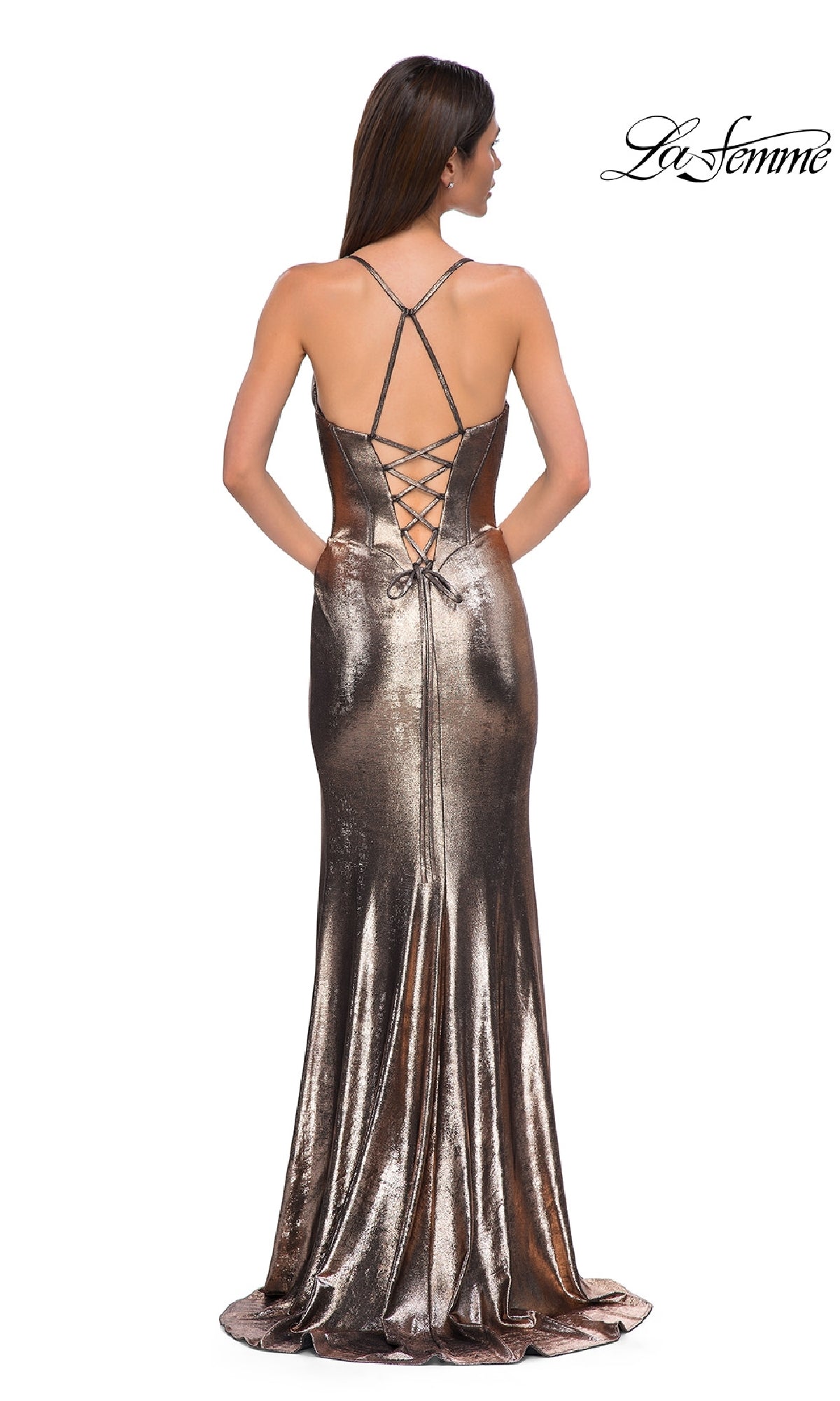 Woman in the La Femme 32877 Lace-Up Long Metallic Prom Dress with thin straps, standing with her back to the camera. The La Femme logo appears in the top right, showcasing this elegant designer prom dress.