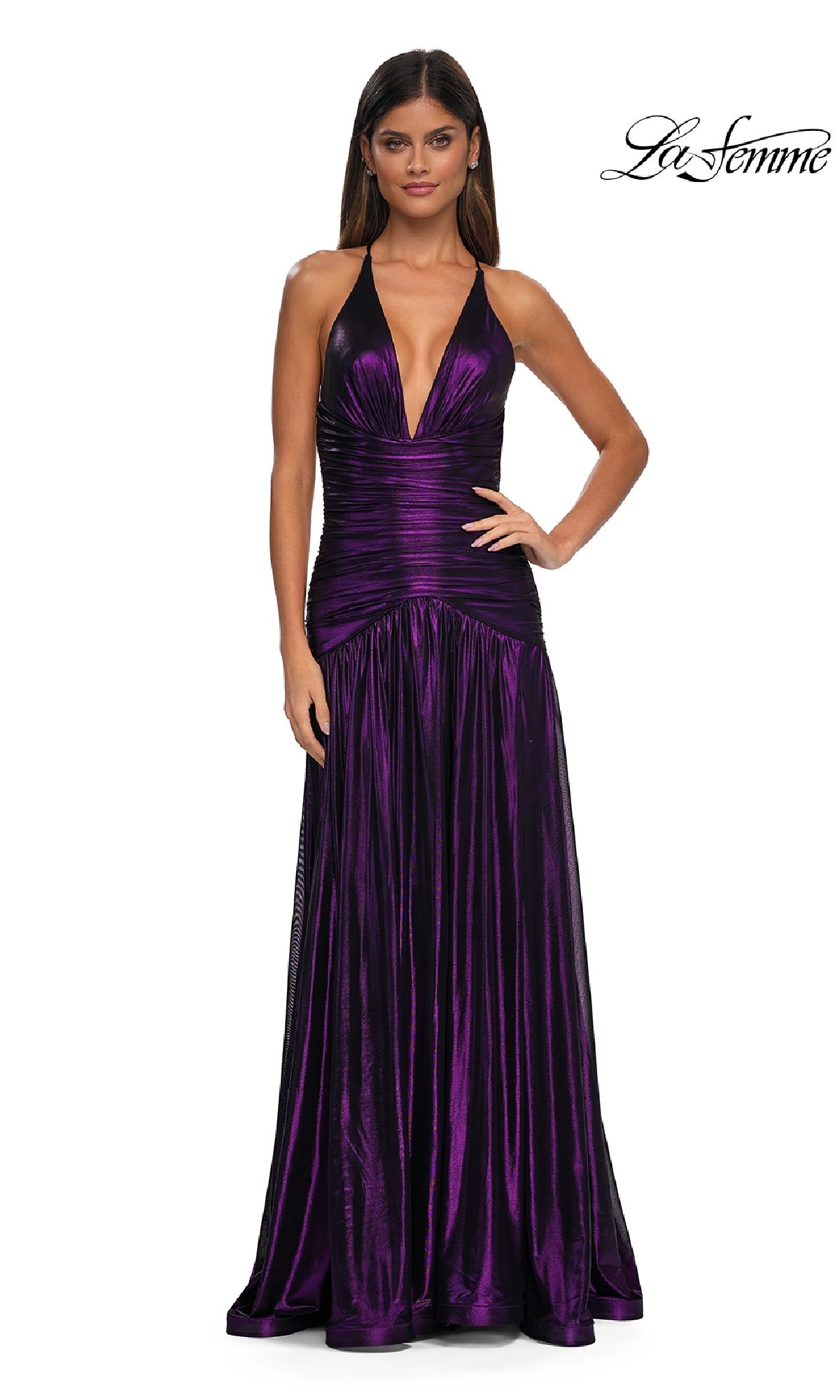 Woman in La Femme 32887: a sleeveless, deep violet metallic prom dress with deep V-neckline, gathered waist, open back, and full-length skirt. La Femme logo in top right corner.