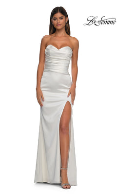 A woman models the La Femme 32896 Strapless Sweetheart Prom Gown in white satin, with a thigh-high slit, against a plain background featuring the "La Femme" logo in the top right corner.
