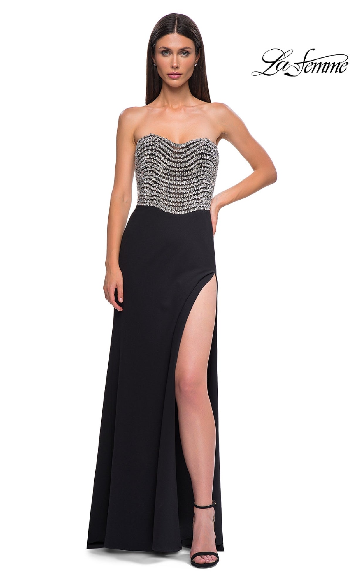 A woman models the Strapless Long Black Prom Dress: La Femme 32910, featuring a beaded bodice and high side slit, against a white background.