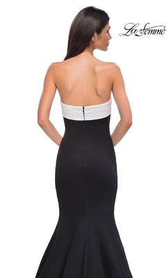 Woman wearing the La Femme 32914 strapless long black prom dress with a white band at the top, photographed from the back against a plain white background.