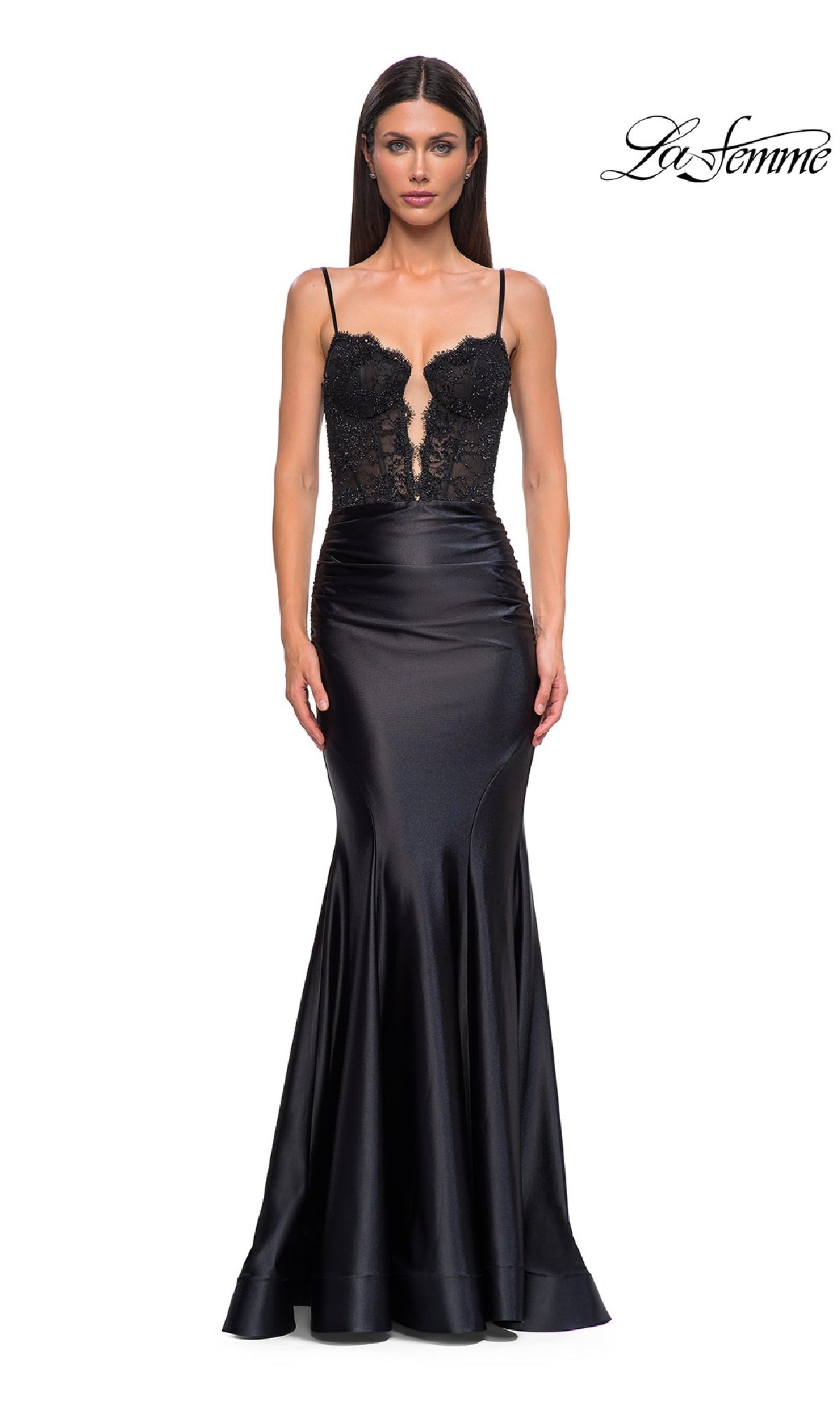 A woman wears the La Femme 32916 black mermaid prom dress, featuring an illusion lace bodice, thin straps, and a sleek satin skirt. The La Femme logo is displayed in the top right corner.