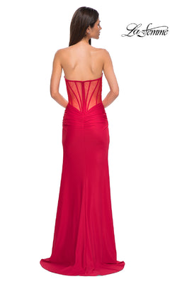 Woman in a strapless La Femme 32923 prom dress with a long skirt and sheer, structured back panel faces away from the camera. The "La Femme" logo appears in the top right, emphasizing this elegant Sheer-Back Long Prom Dress.