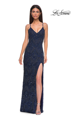A woman models the Vintage Long Beaded Prom Dress: La Femme 32928—navy blue with beading, spaghetti straps, a thigh-high slit—paired with silver heels. The "La Femme" logo is visible in the top right corner.