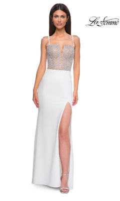 A woman models the Beaded-Corset Long Prom Dress (La Femme 32930), featuring a white jersey fabric, sheer embroidered deep v-neck bodice, and high slit, against a plain white background. "La Femme" appears in the top right corner.