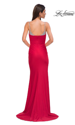 A woman faces away, wearing the La Femme 32939 Beaded-Neckline Long Prom Dress in red with silver straps, upper back details, and a slight train. The "La Femme" logo is visible in the top right corner.