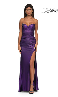 A woman wears the La Femme 32946, a strapless long metallic prom dress with a sweetheart neckline, ruched bodice, and thigh-high slit, standing against a white background. The La Femme logo appears in the top right corner.