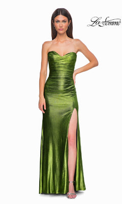 A woman models the La Femme 32946, a strapless long metallic green prom dress with a sweetheart neckline, ruched bodice, and high slit. She poses against a white background with the "La Femme" logo in the top right corner.