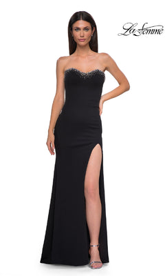 A woman models the La Femme 32975, a strapless long black prom dress with pearl-embellished neckline and high slit, against a plain white background—an elegant evening gown ideal for special occasions.