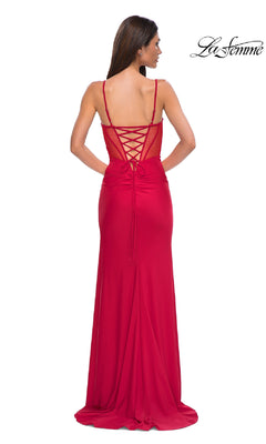 A woman stands facing away, wearing the La Femme 32977 Side-Sash Lace-Up Long Prom Dress in red. The "La Femme" logo is displayed in the top right corner.