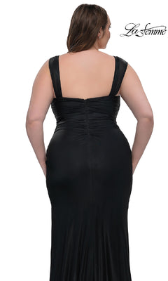 A plus-size woman is shown from the back in the La Femme 32991 simple long prom dress featuring black fabric, wide straps, and ruched detail. The photo is on a white background with the La Femme logo in the top right corner.