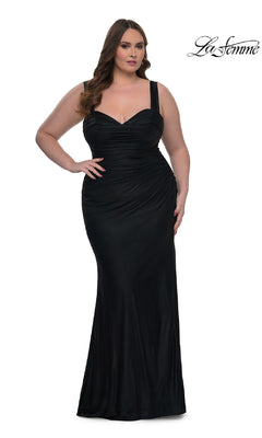 A woman models the Plus-Size Simple Long Prom Dress: La Femme 32991—an elegant, fitted black gown—against a white backdrop, with the "La Femme" logo displayed in the top right corner.