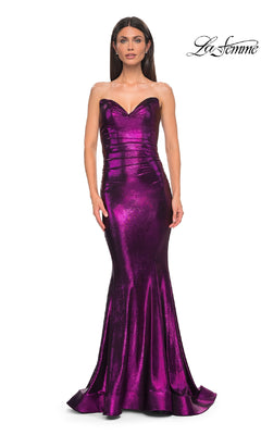 A woman models the La Femme 32995 strapless long metallic purple prom dress, posing against a white background with the La Femme logo at the top right.