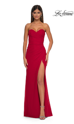 A woman wears the Lace-Up Strapless Long Prom Dress: La Femme 33018, featuring a sweetheart neckline and thigh-high slit, standing against a white background. The La Femme logo appears in the top right corner.