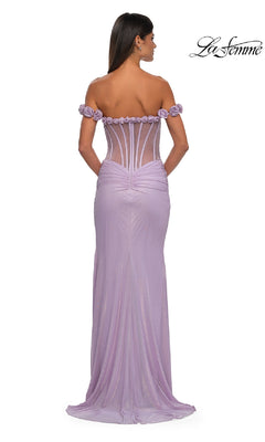 Woman wearing Sheer-Corset Long Prom Dress: La Femme 33004, a floor-length off-the-shoulder prom dress in light purple with floral accents and a semi-sheer corset back, viewed from behind. "La Femme" logo appears in the top right corner.
