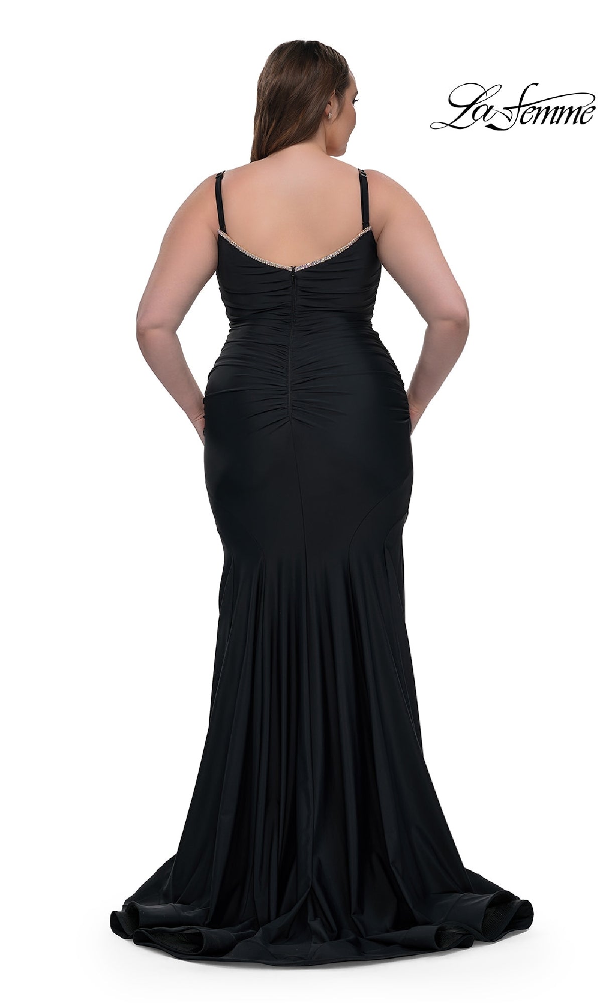 A woman is seen from the back wearing the Plus-Size Floor-Length Prom Dress: La Femme 33057 with thin straps, against a white background.