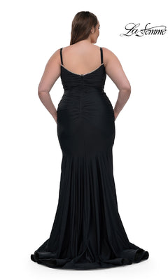 A woman is seen from the back wearing the Plus-Size Floor-Length Prom Dress: La Femme 33057 with thin straps, against a white background.
