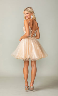 Woman in the Lace-Up Short Butterfly Homecoming Dress 3341, featuring a lace-up back, stands smiling over her shoulder in high heels.