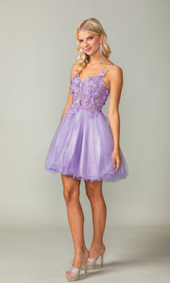 A woman poses in the Lace-Up Short Butterfly Homecoming Dress 3341—light purple with lace details and a tulle skirt—paired with silver heels, set against a plain background.