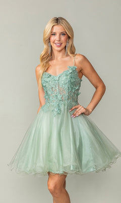 A woman wears the Lace-Up Short Butterfly Homecoming Dress 3341, a light green babydoll dress with delicate butterfly details and a sheer bodice, standing against a plain background.