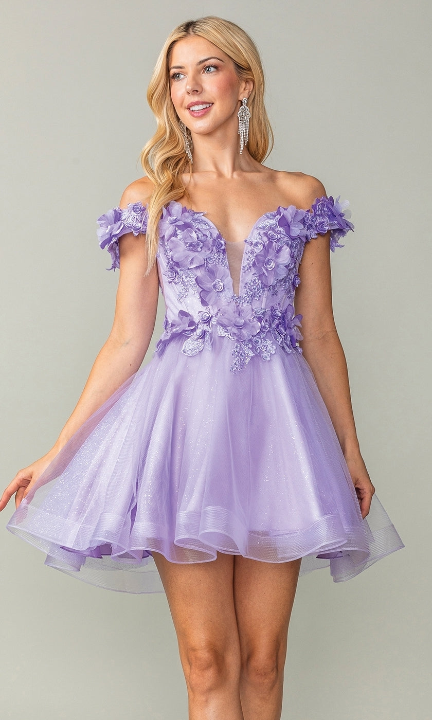 A woman models the Off-the-Shoulder Short Babydoll Hoco Dress 3344, featuring floral appliques and a tulle skirt, standing against a neutral background.