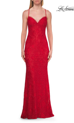 A woman wearing the La Femme 33514 long prom dress in red, featuring thin straps and a sweetheart neckline, stands against a white background.