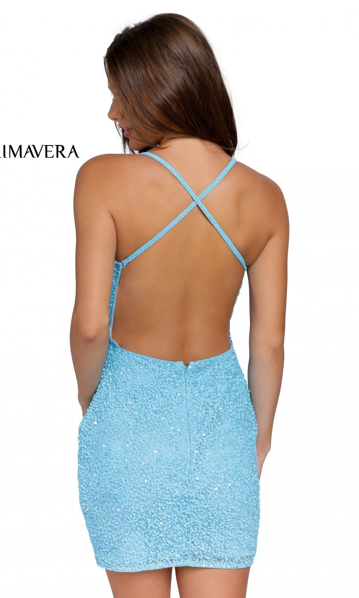 A woman stands with her back to the camera wearing the Short V-Neck Backless Sequin Homecoming Dress 3352 in light blue, featuring an open back with crisscross straps.