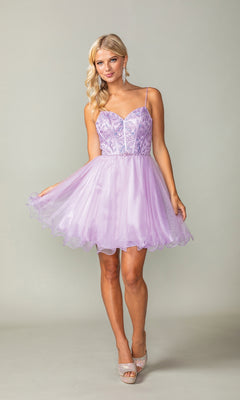 A woman wearing the Lace-Up Short Babydoll Homecoming Dress 3352, featuring a light purple tulle skirt and spaghetti straps, stands against a plain background.
