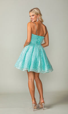A woman faces away, wearing the Short A-Line Sequin Homecoming Dress 3359 in sparkly light blue with thin straps and beige heels, set against a plain background.