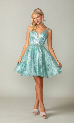 A woman poses in the Dancing Queen 3364 Short Glitter-Print Hoco Dress—a sleeveless, light blue, knee-length semi-formal dress with sequin embellishments and a tulle skirt—wearing open-toe heels and earrings against a plain background.
