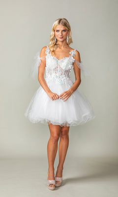 A woman poses against a plain background wearing the Dancing Queen 3365 short homecoming dress in off white, featuring floral appliqué details, sheer shoulder straps, and a delicate glitter tulle skirt.