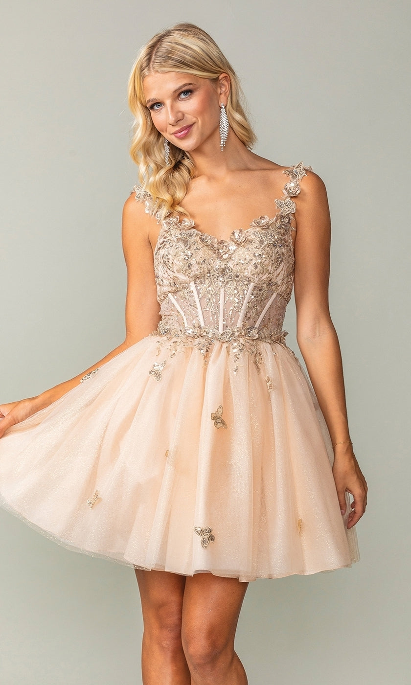 A woman wears the Rose Gold Short Butterfly Homecoming Dress 3367—sleeveless, short, with light pink tulle and floral details—posing against a plain background.