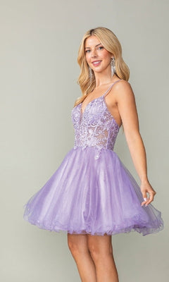 Woman wearing a purple short dress against a plain background